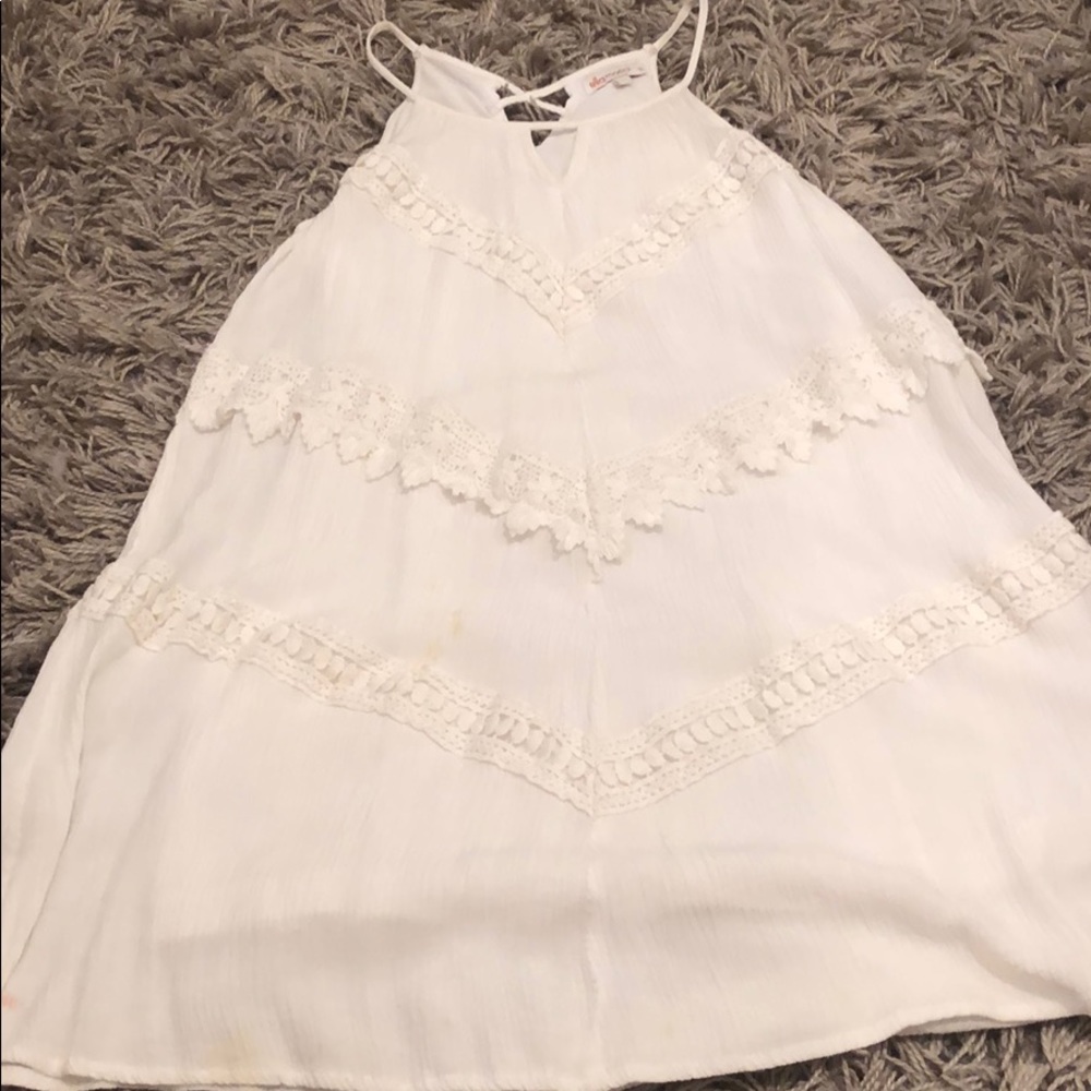 I am selling a white dress that flows.